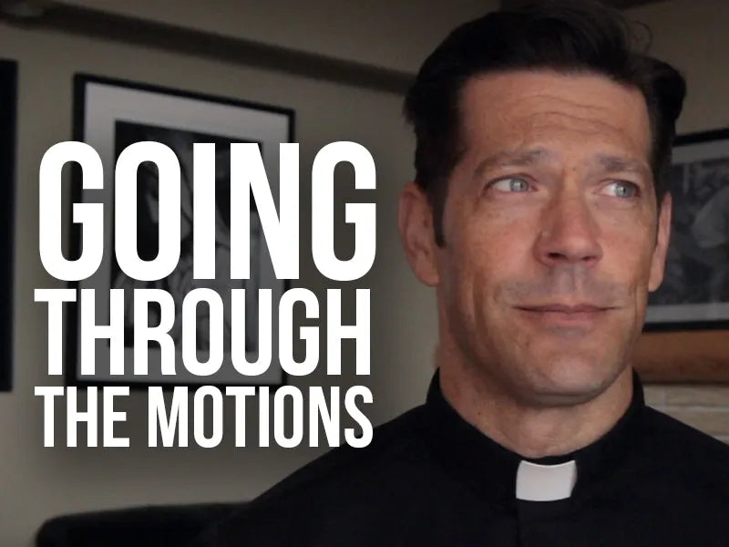 Fr. Mike with text "going through the motions"