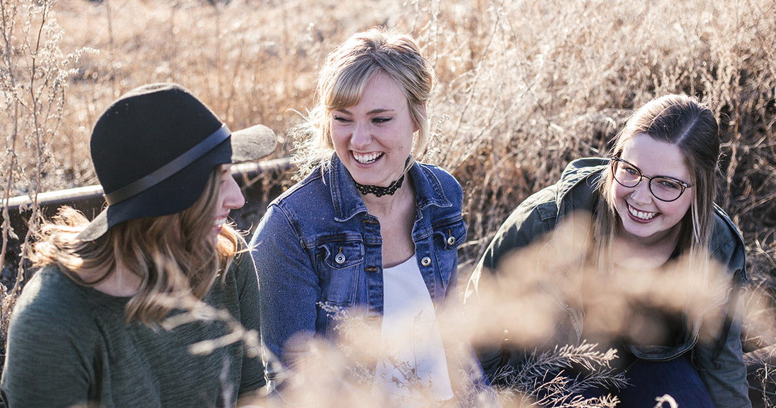 Three women practicing the art of conversation