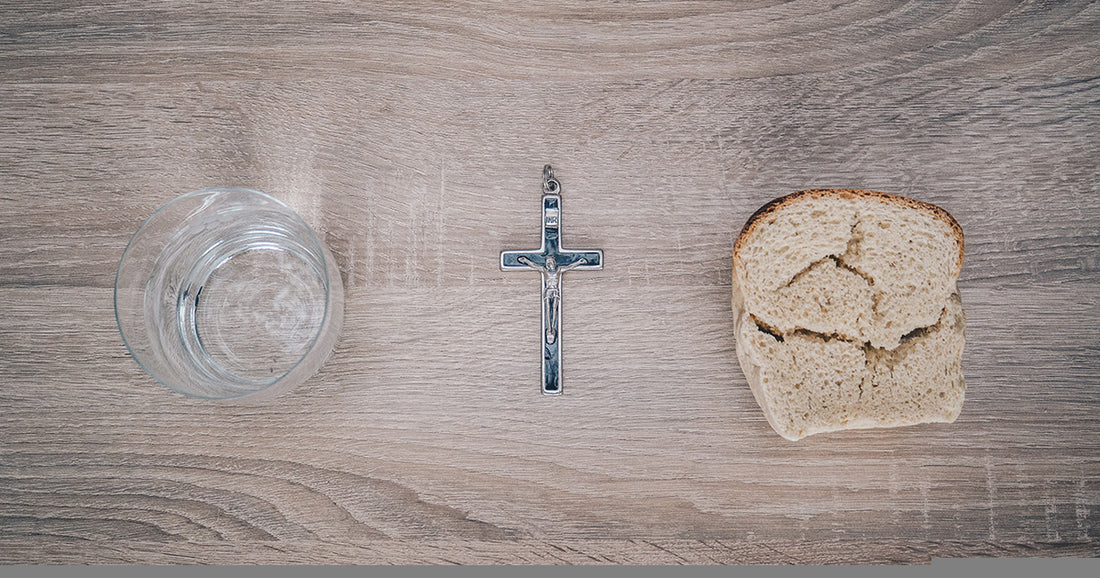 bread, water, and a crucifix