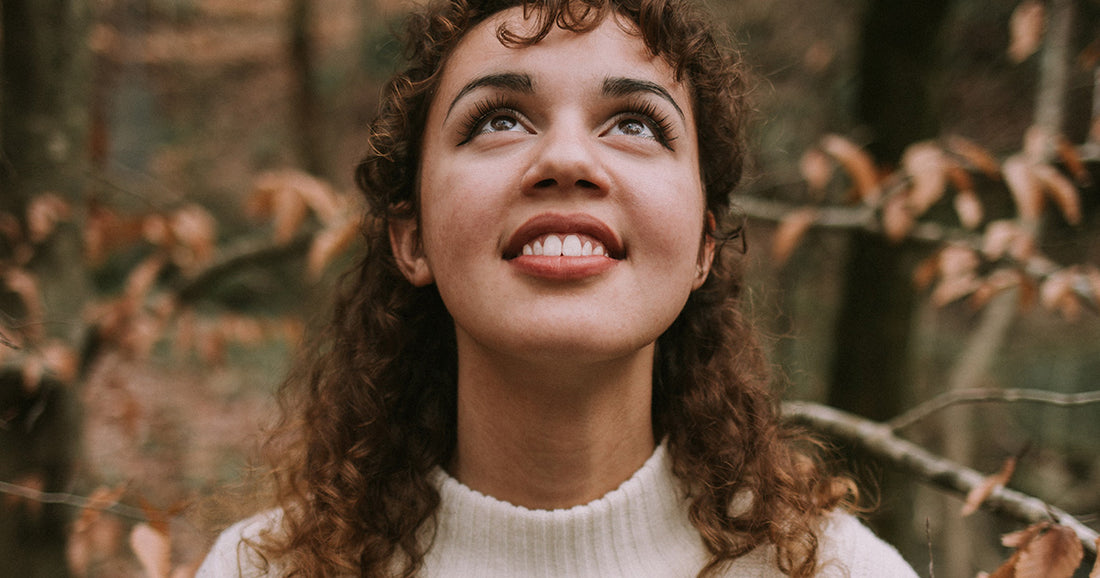 young woman looking up