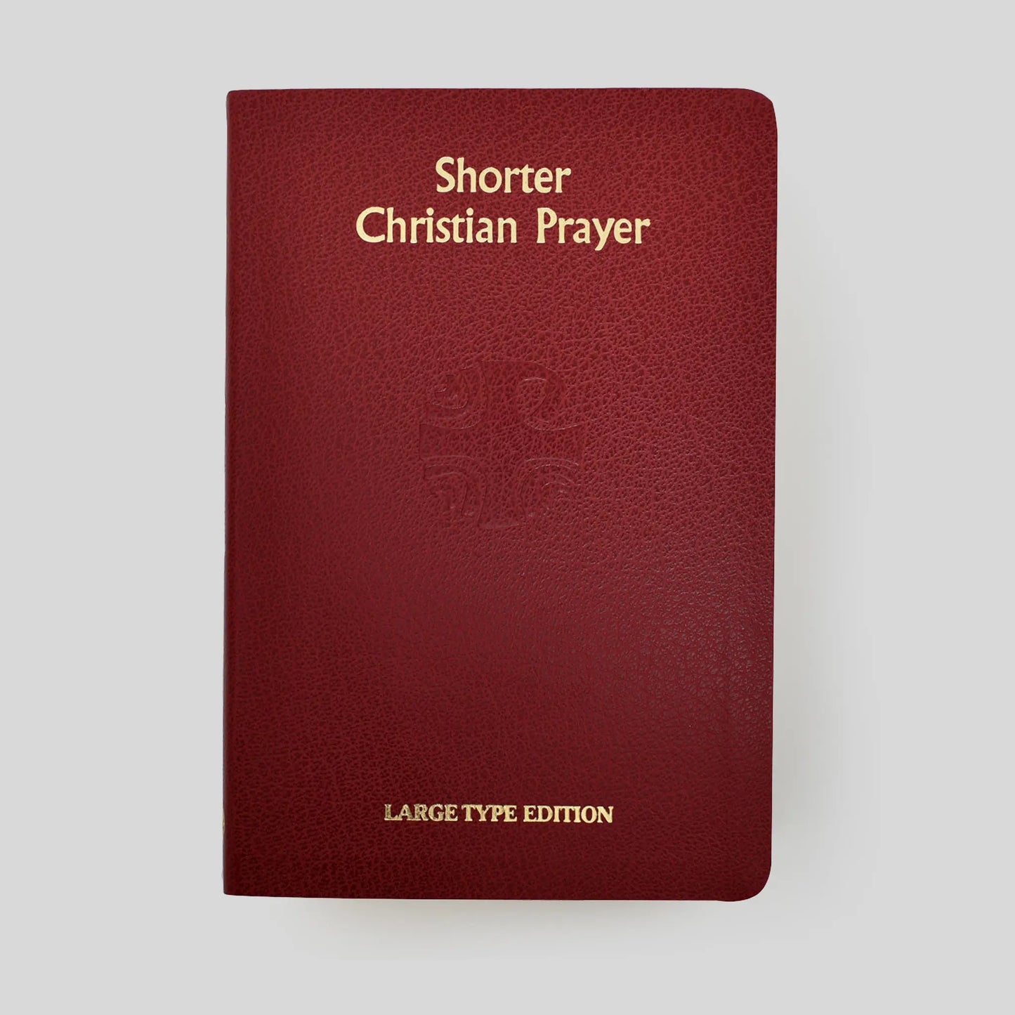 Red book titled 'Shorter Christian Prayer' with 'Large Type Edition' text on a white background