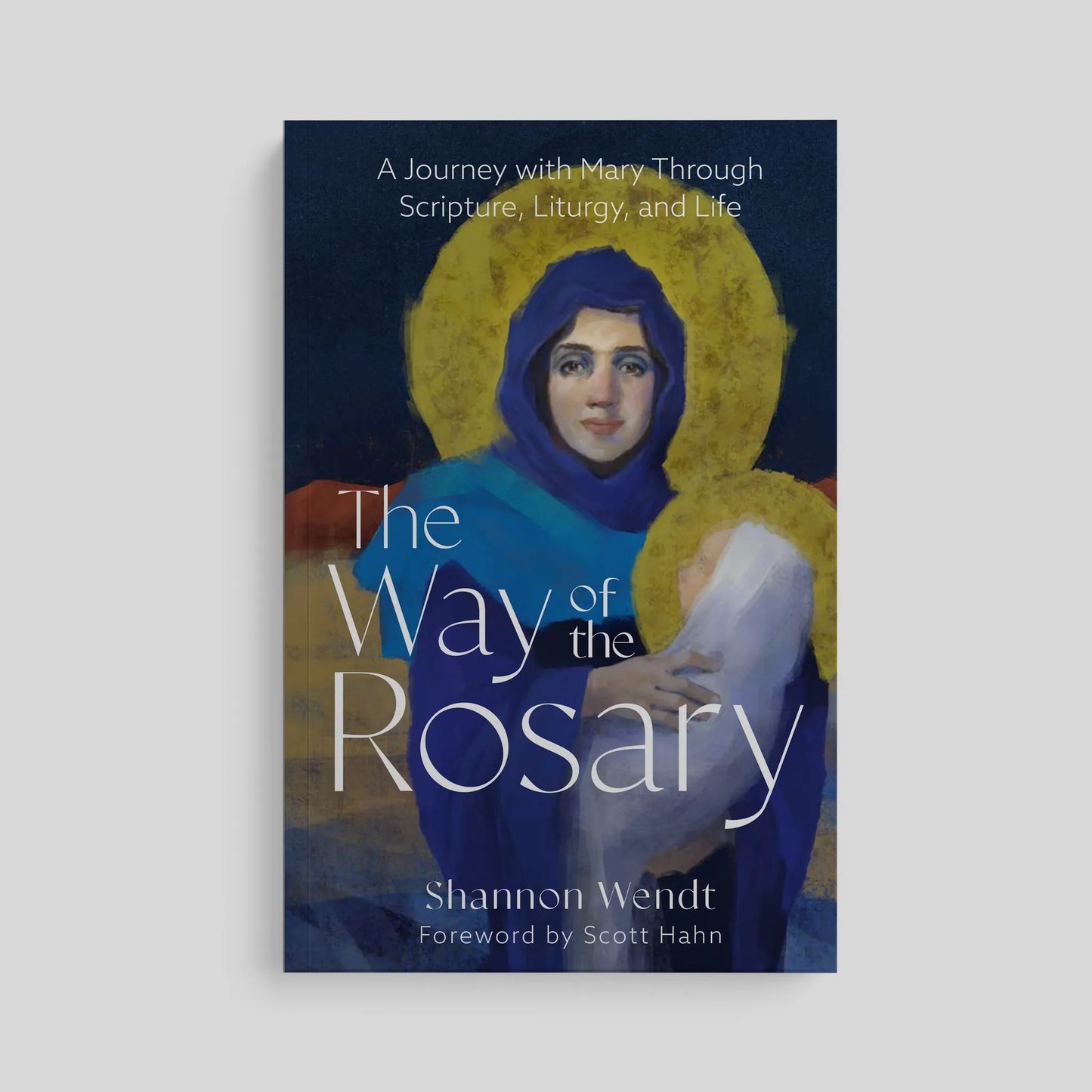 Book cover of 'The Way of the Rosary' with a depiction of Mary holding Jesus against a dark blue background.