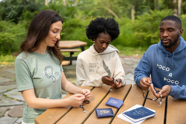 New Rosary in a Year T-shirts, Stickers, Leather Pouches, and More Inspire Catholics on Their Journey to Heaven, “Poco a Poco”