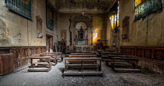 abandoned church covered in dirt and dust