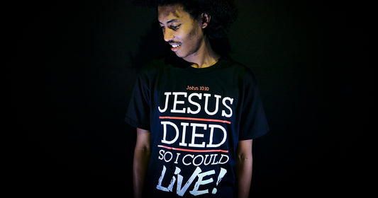 man wearing a shirt with statement about Jesus