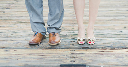 man in woman standing next to each other