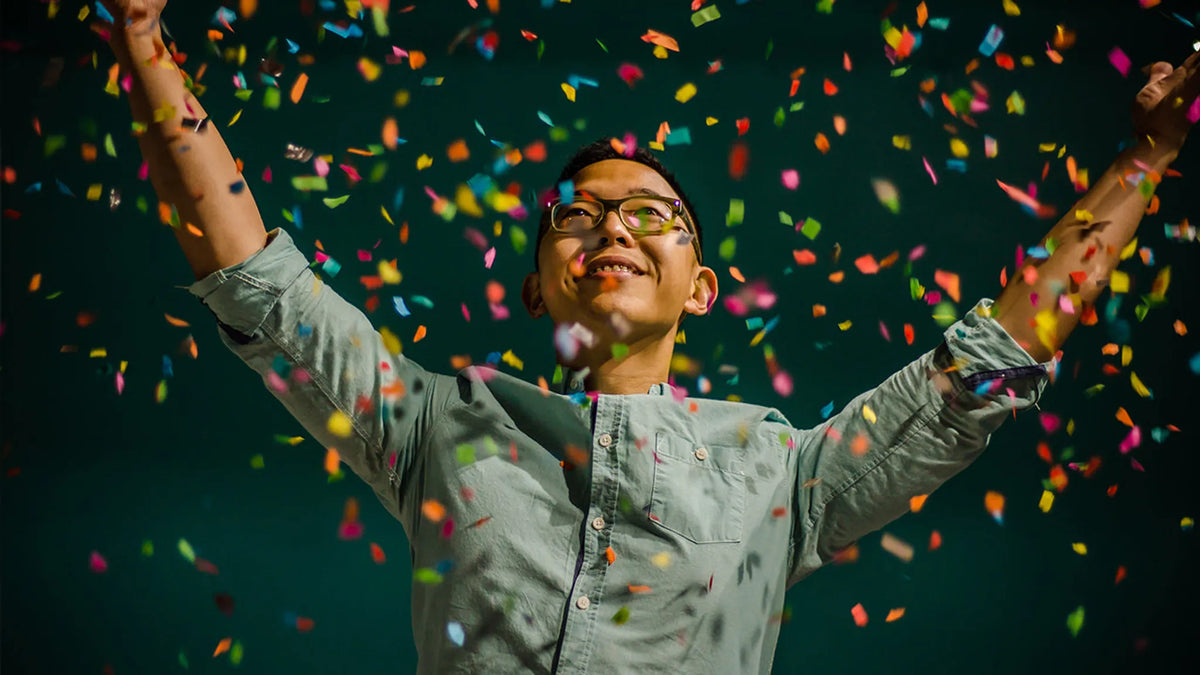 person throwing confetti