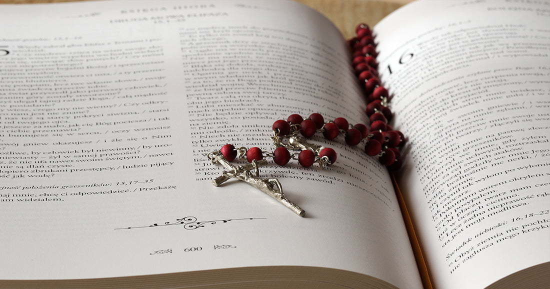 rosary on a bible