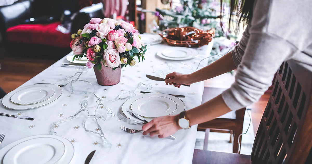woman setting table