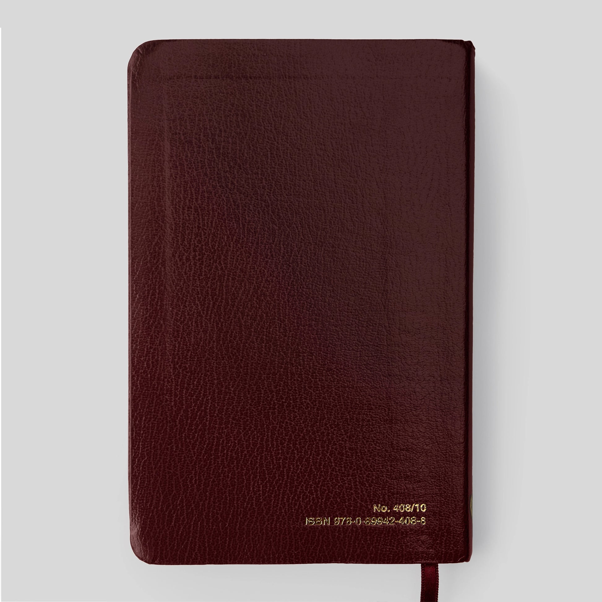 Red book titled 'Shorter Christian Prayer' on a light gray background