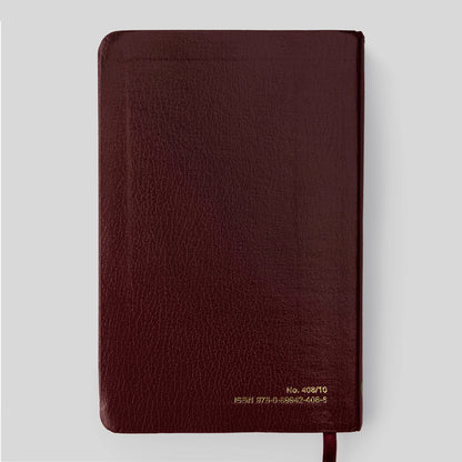 Red book titled 'Shorter Christian Prayer' on a light gray background