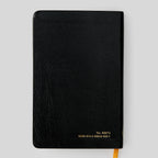 Black book titled 'Shorter Christian Prayer' on a light gray background