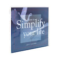 The cd case for How to Simplify Your Life by Jeff Cavins and Ascension. The cover features a beautiful white bird landing on water.