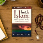 A tabletop lifestyle shot of the catholic book, Inside Islam: A Guide for Catholics by Daniel Ali and Robert Spencer published by Ascension, sitting on a wooden table next to a rosary. The cover features a muslim.
