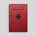 Red book titled 'The Liturgy of the Hours Supplement' with a black cross on a gray background