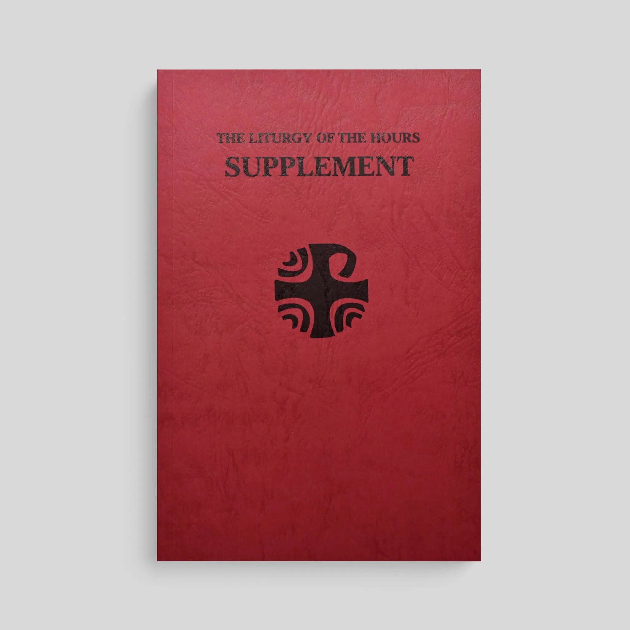 Red book titled 'The Liturgy of the Hours Supplement' with a black cross on a gray background